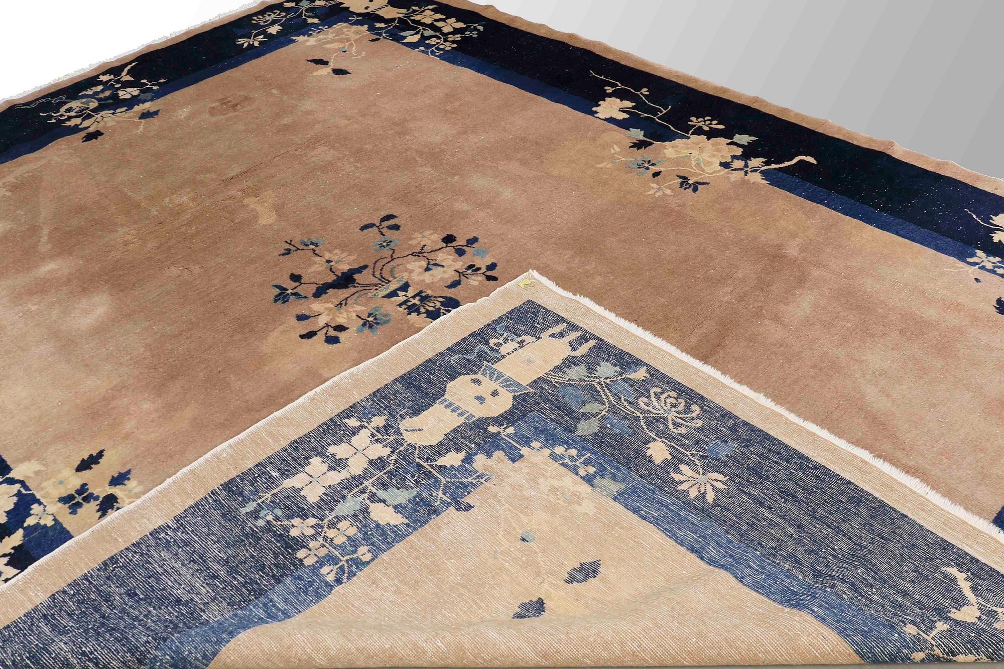 A CARPET, semi-antique China, art deco, around 345 x 272 cm.