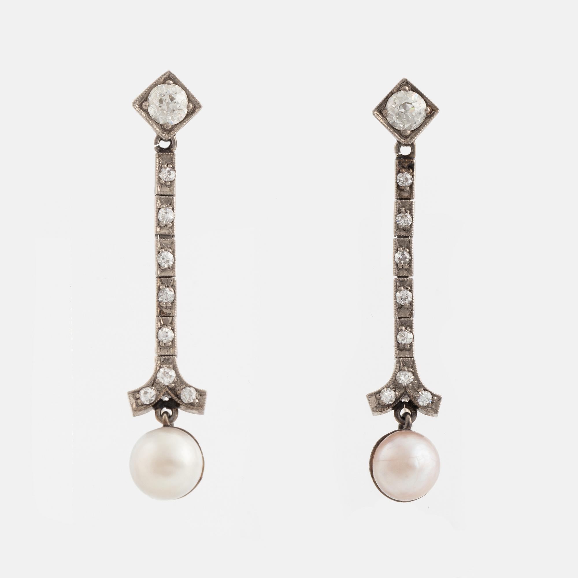 A pair of 18K gold and cultured halfpearl and diamond earrings.