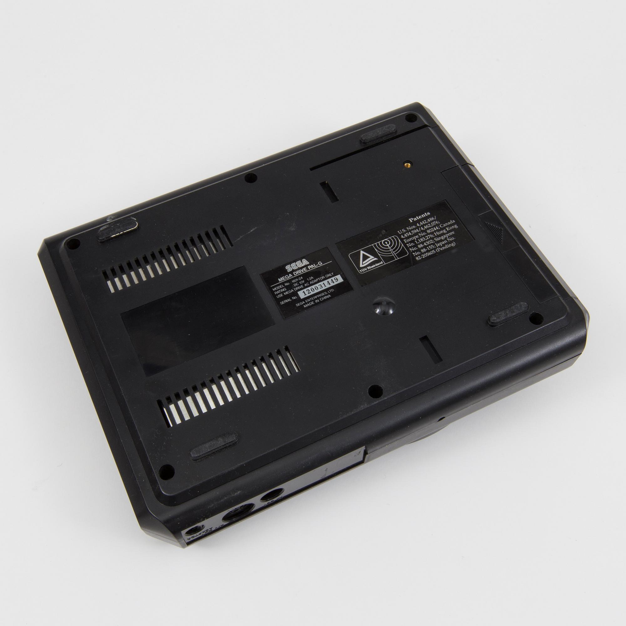 A "Sega Mega Drive" and nine games, 1990.s.