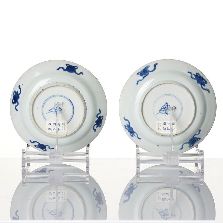 A pair of blue and white 'dragon and fish dishes', Qing dynasty, Kangxi (1662-1722).