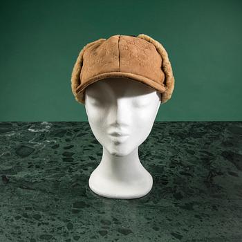 A fue hat by GUCCI in size M.