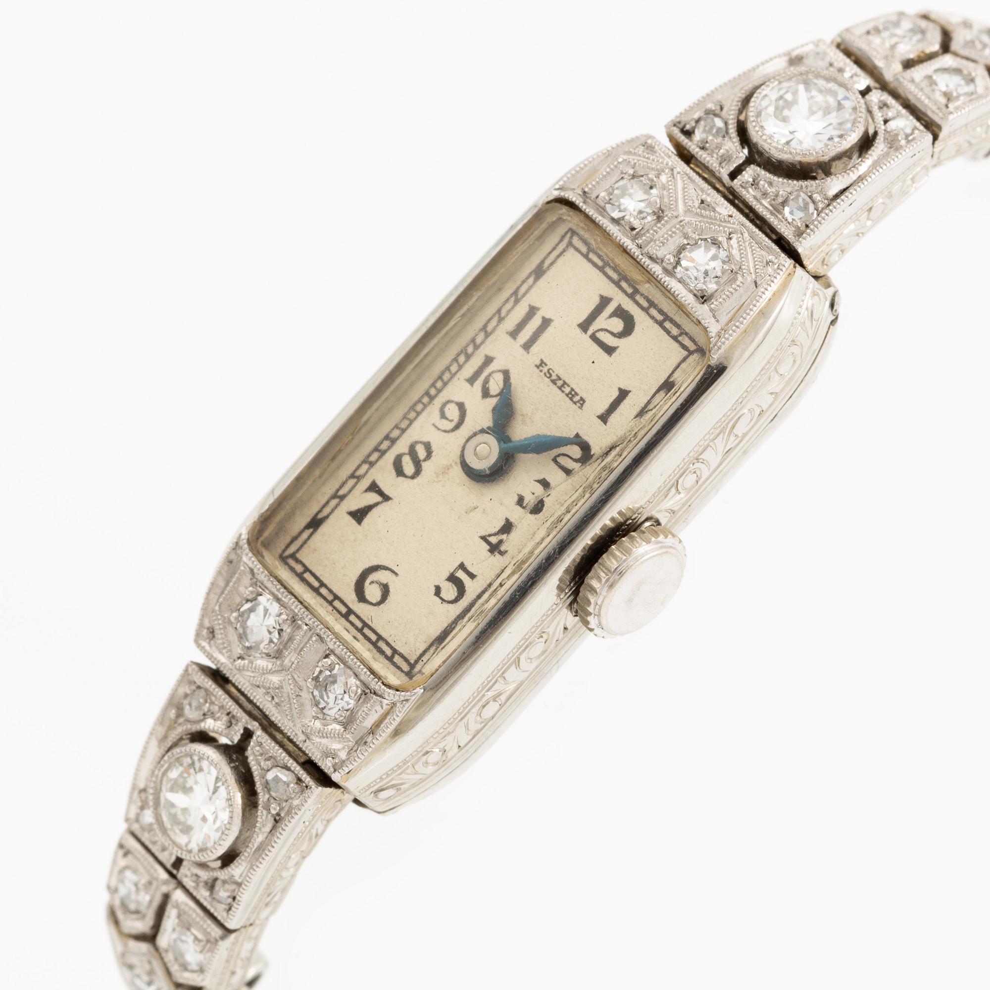 Smyckesur/Aftonklocka, boett 18K vitguld med diamanter.