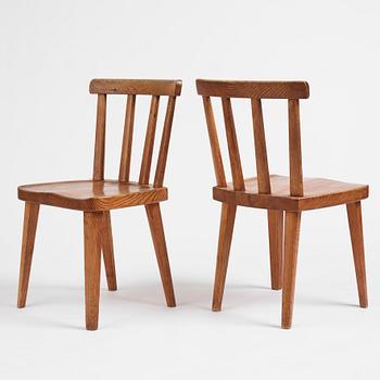 Axel Einar Hjorth, a set of six "Utö" stained pine chairs, Nordiska Kompaniet 1930s.