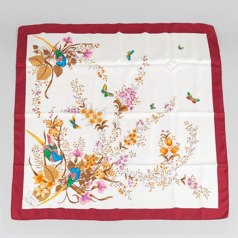Gucci, a silk scarf.
