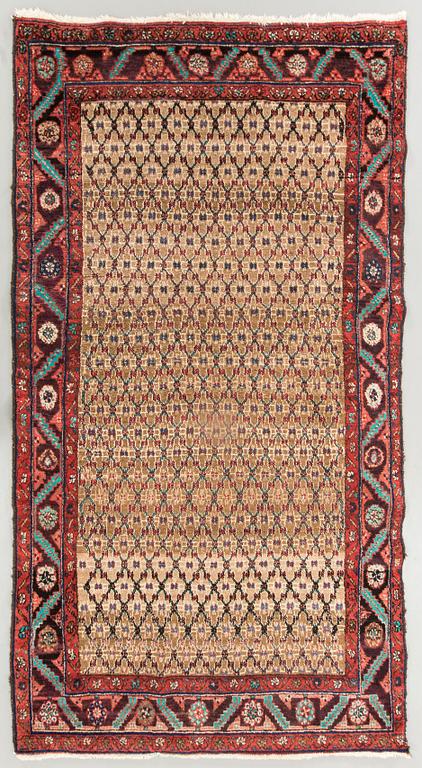 AN old Koliai carpet ca 240 x 131 cm.