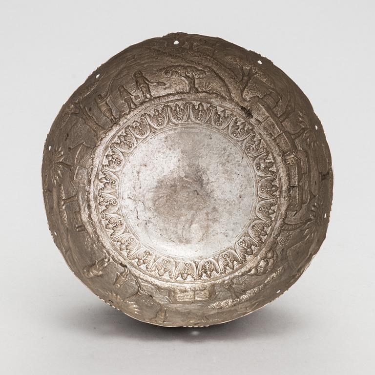 A repoussé silver bowl, mid-20th century.