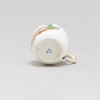 A pair of cups and saucers, "Sévrès"like mark, 19th century.