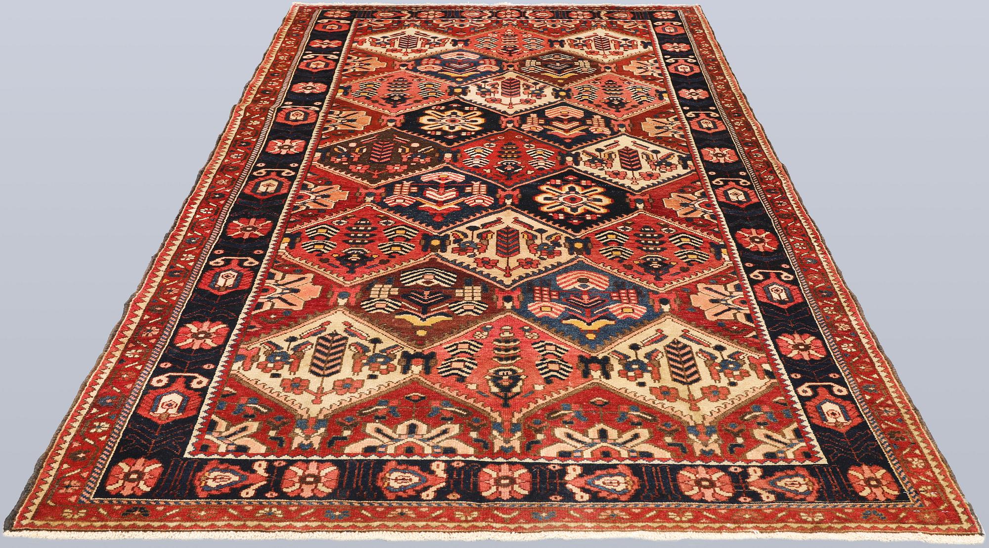 A rug, Bakhtiari, approx. 296 x 159 cm.