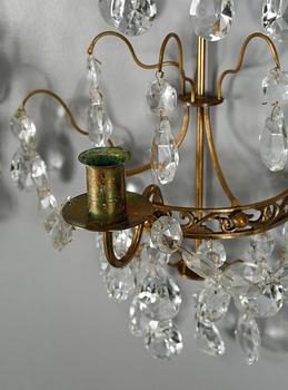 VÄGGLYSTRAR, ett par, gustaviansk stil, 1900-tal.