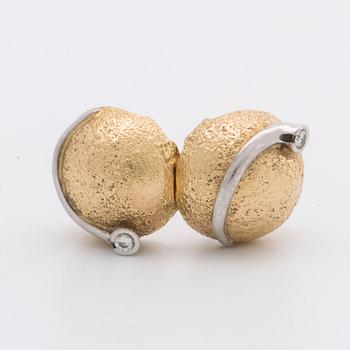 LYNGGAARD lås 18K guld och vitguld m 2 briljanter ca 0,10 ct totalt.
