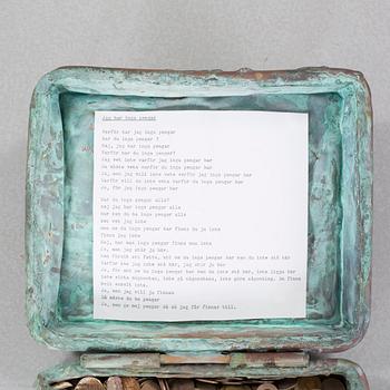 a metal sculpture, signed and dated -83.
