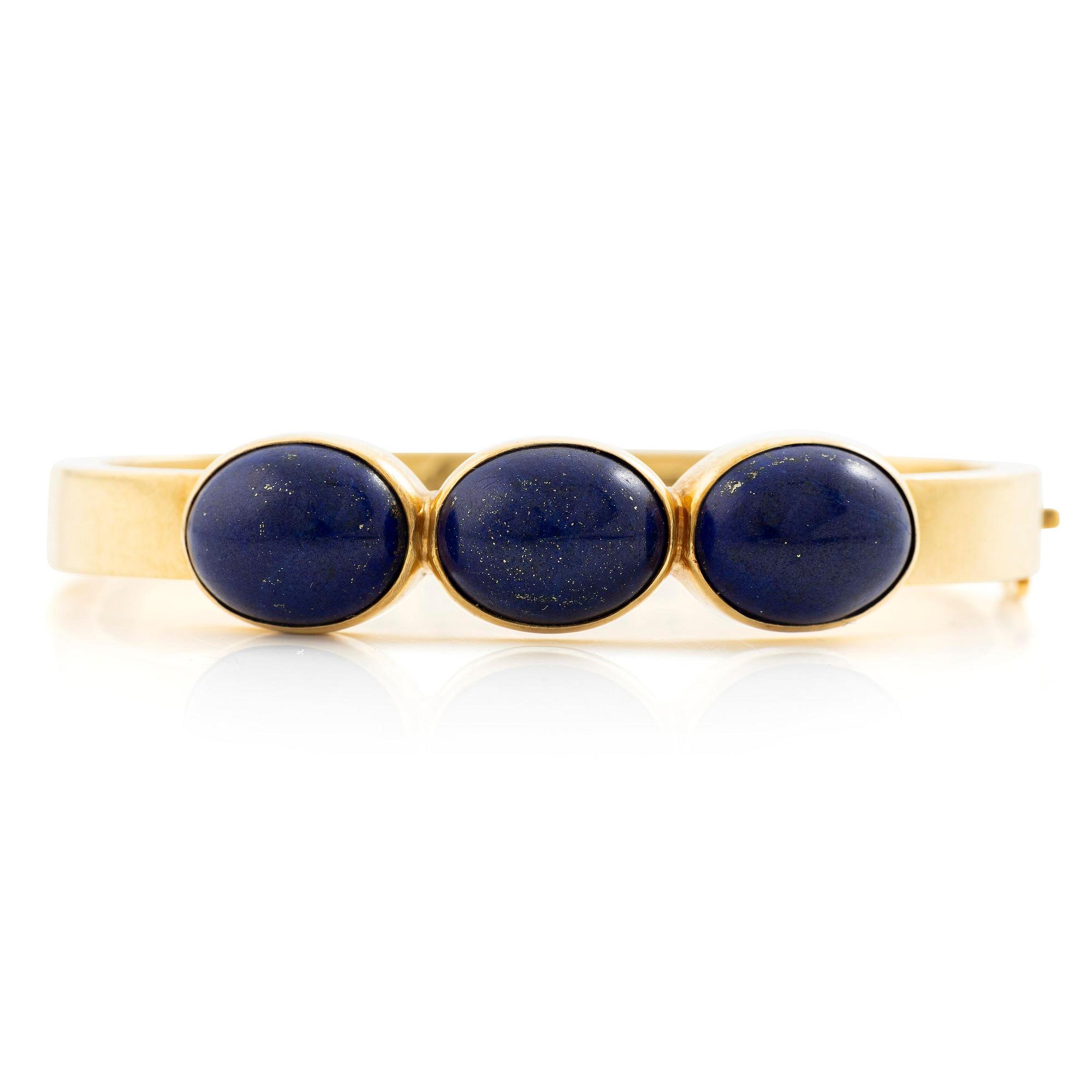 Wiwen Nilsson, a bracelet, 18K gold with lapis lazuli, Lund 1965.