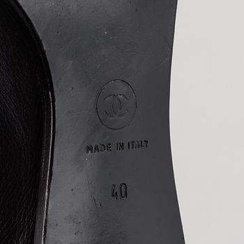 CHANEL, a pair of leather boots, size 40.