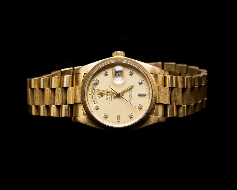 ARMBANDSUR, 18K guld. Rolex Oyster Perpetual Day-Date. Vikt ca 144 g.