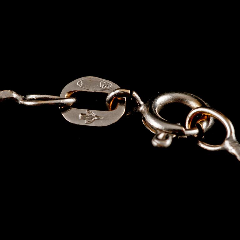 HÄNGE, 18k vitguld med äldre briljantslipad diamant, importstämplat, omkring 1900-talets tredje kvartal. Vikt 3 g.
