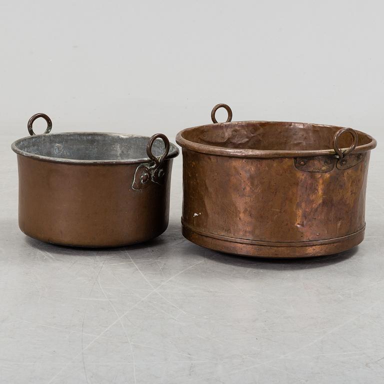 two copper pots from the 19th century.