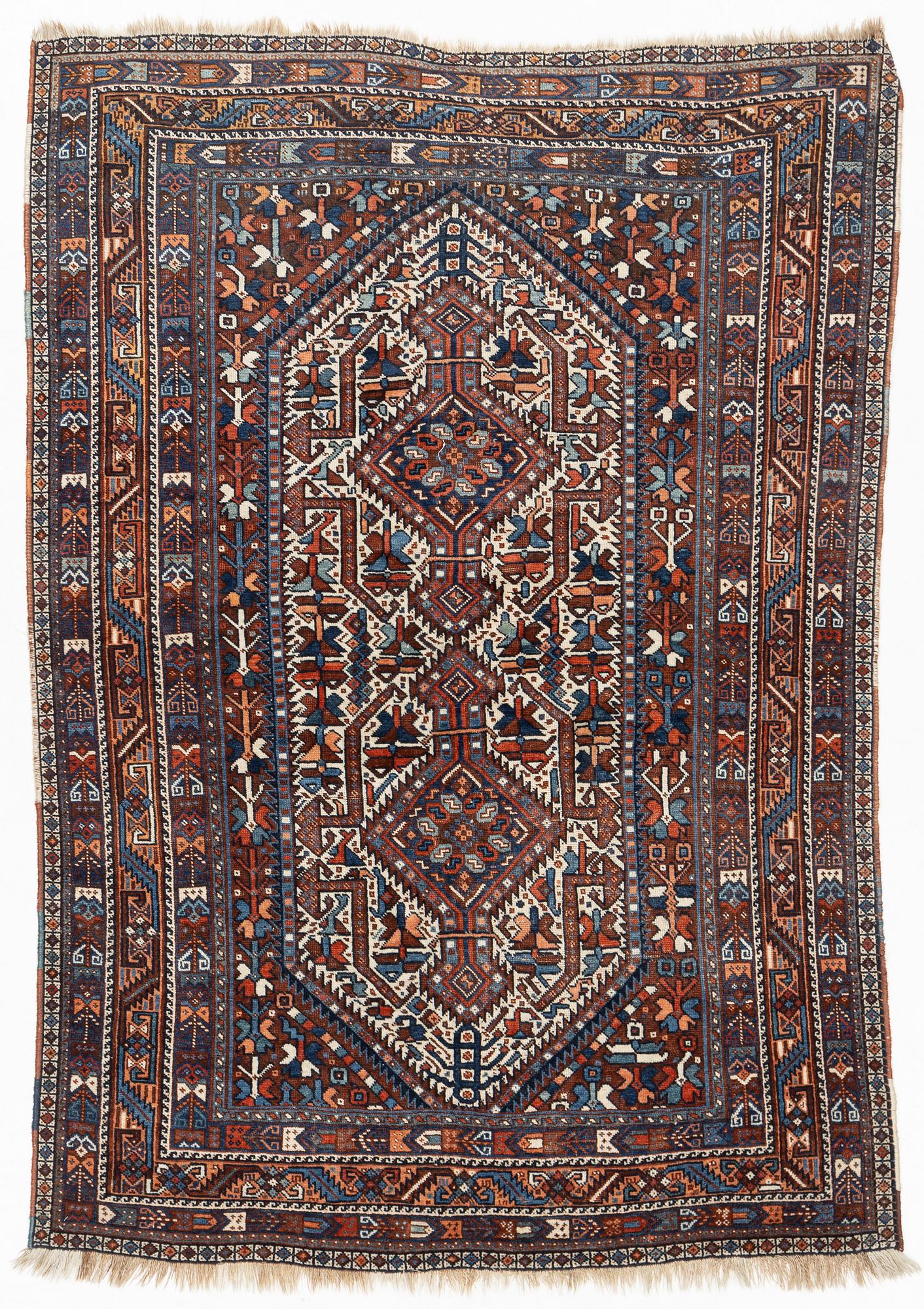 A carpet, Shiraz, circa 211 x 147 cm.