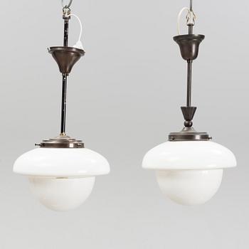 A pair of glass and patinated brass ceiling lights, Asea, 1930's.