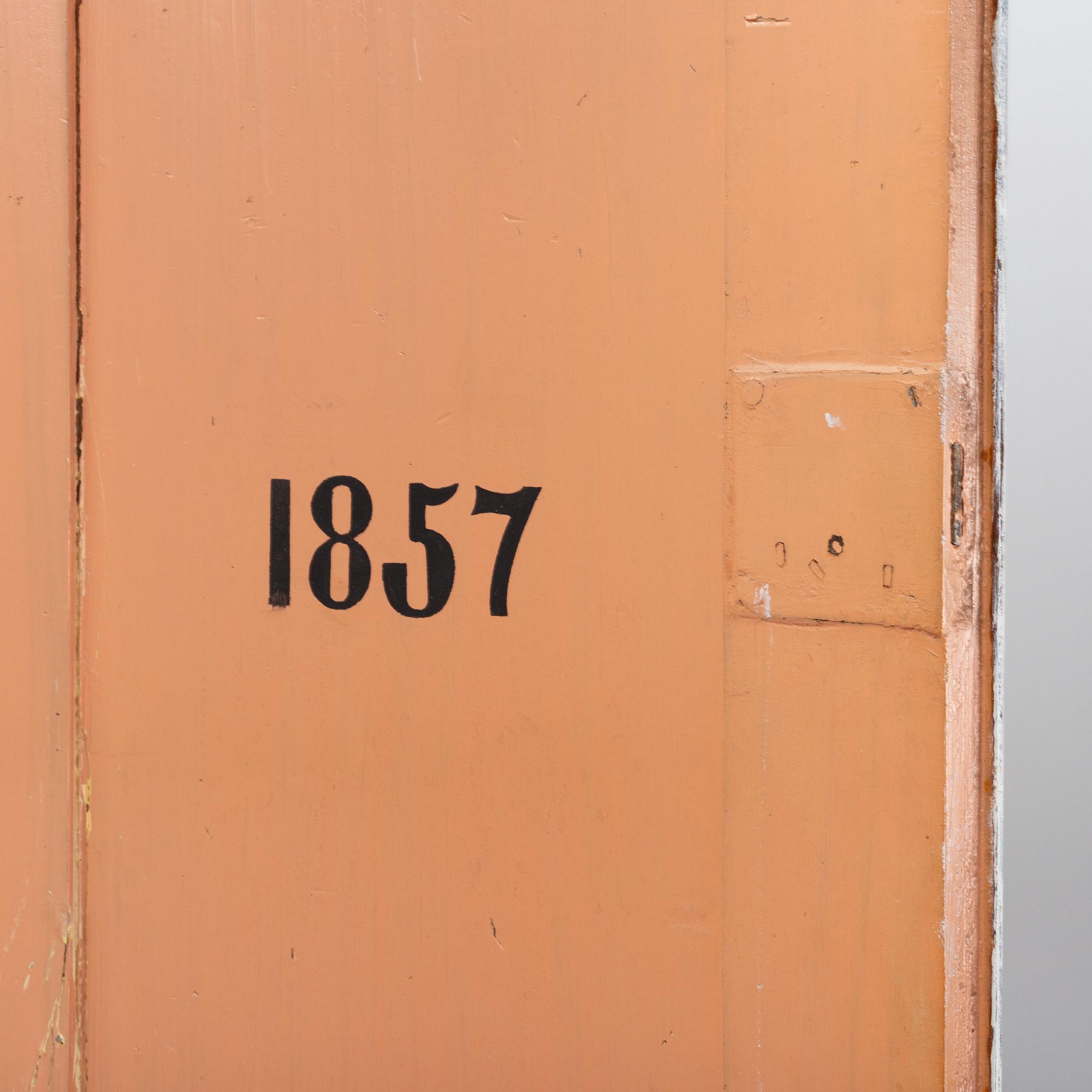 An 19th Century corner cabinet.