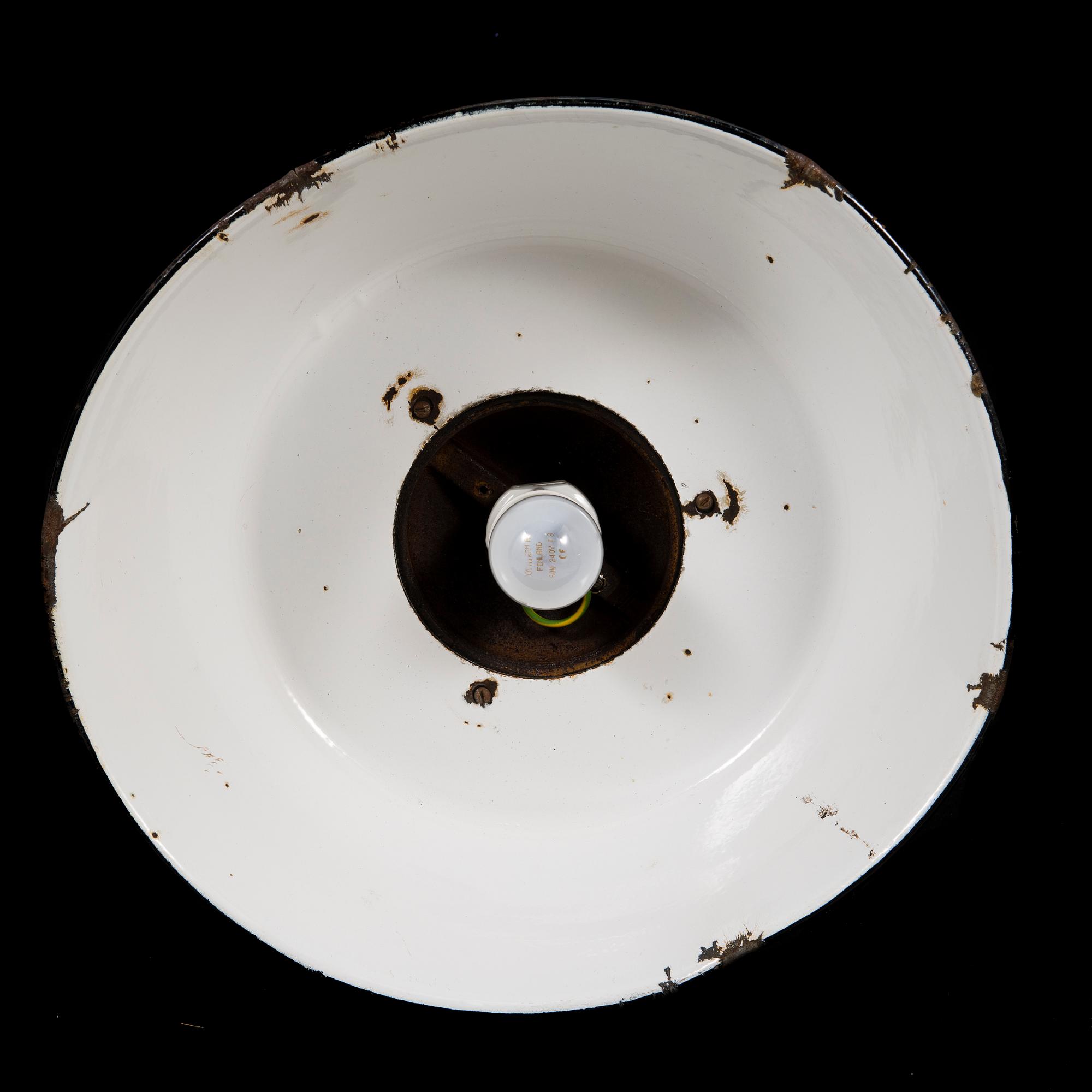 A industrial lamp by Paavo Tynell for Taito Oy, Finland.