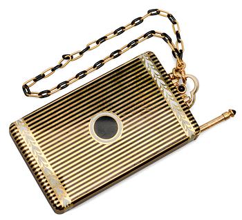 CARTIER MAKE-UP BOX, 18K gold, enamel, onyx. New York 1940 s. Weight 152 g.