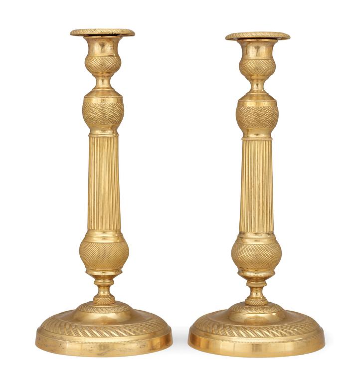 A pair of Empire candlesticks.