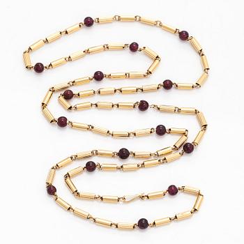 A 16K gold necklace with garnets.
