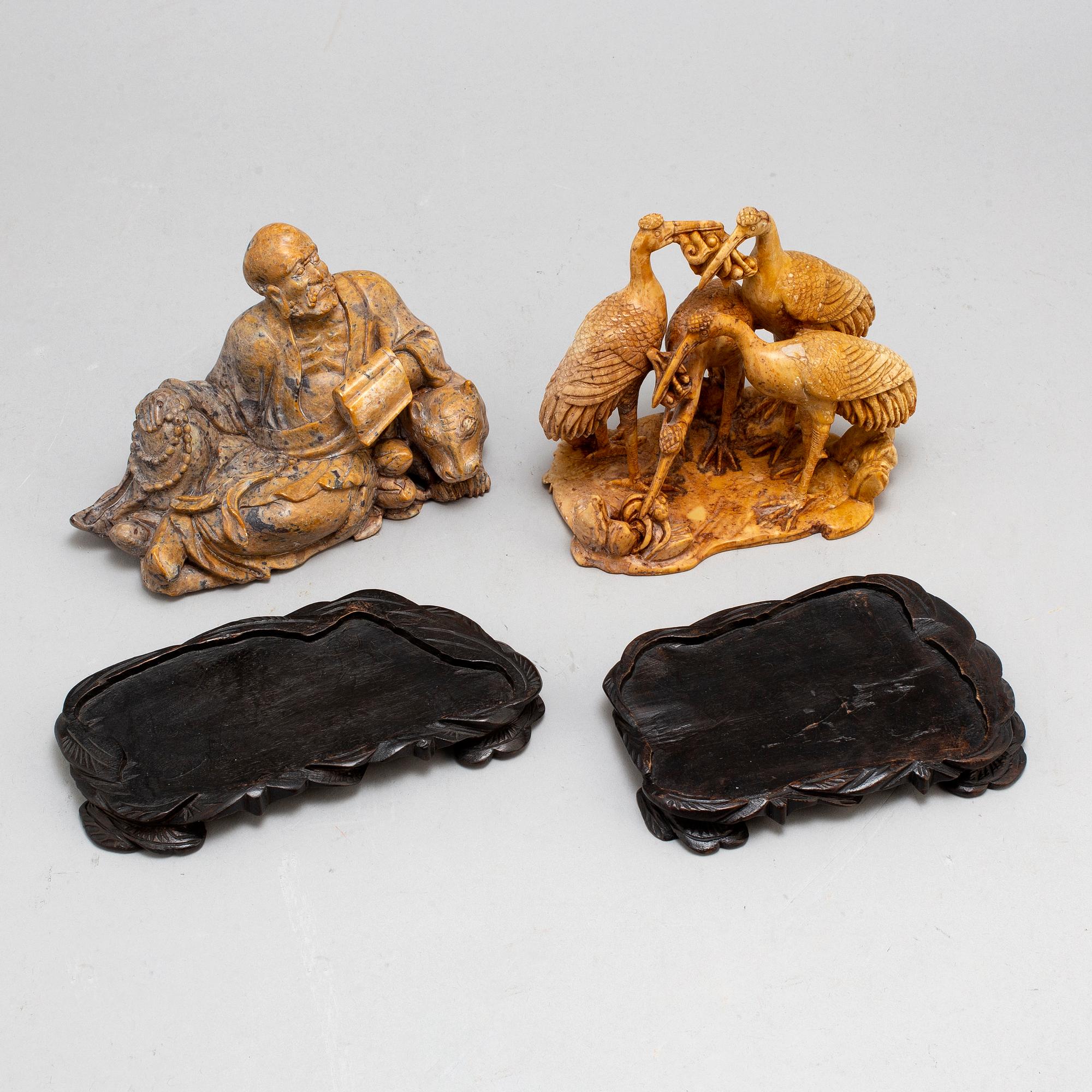 Two Chinese sculptures, one soapstone, 20th century.