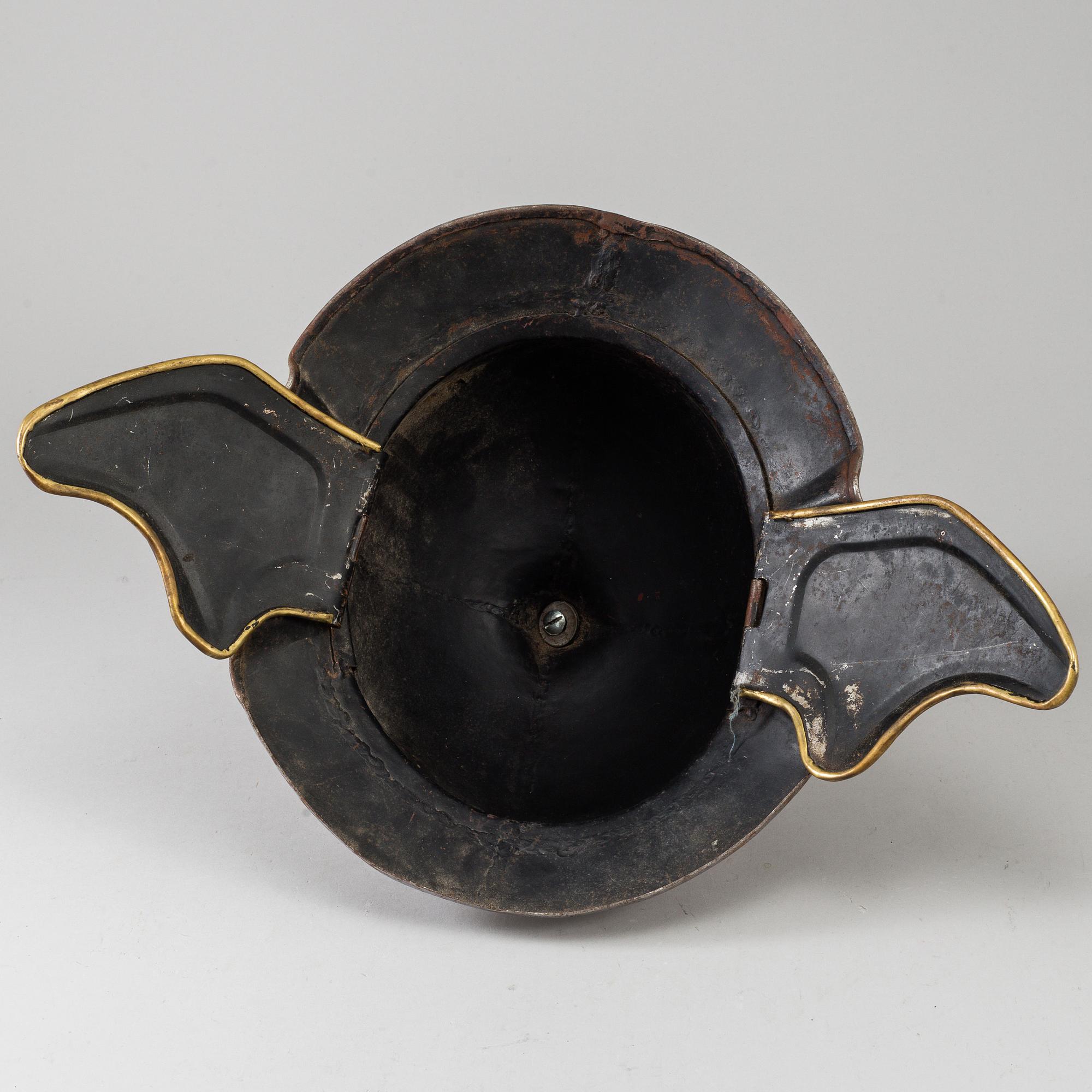 A 20th century replica helmet.