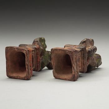 A pair of green and yellow glazed joss stick holders, Ming dynasty (1368-1644).