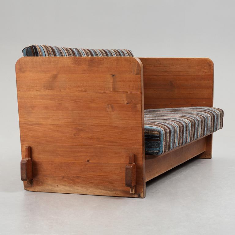 Axel Einar Hjorth, a stained pine "Lovö" sofa, Nordiska Kompaniet, Sweden 1930's.
