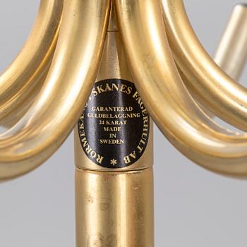 TAMBURMAJOR, guldpläterad metal, Rörmekano. Skånes Fagerhult, Sverige. 1970 / 80-tal.