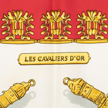 Hermès, a 'Les Cavaliers d'Or' silk scarf.