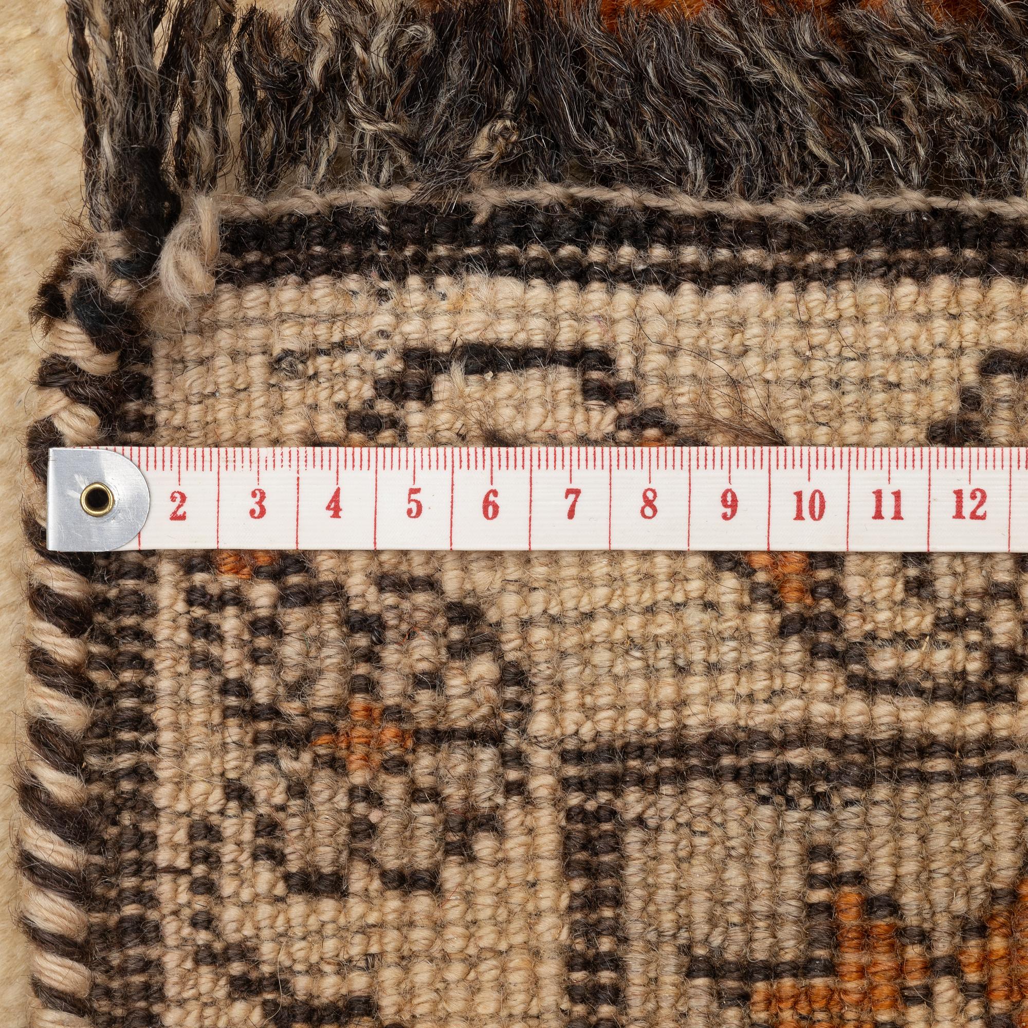 A rug, possibly Shiraz, c. 192 x 104 cm.