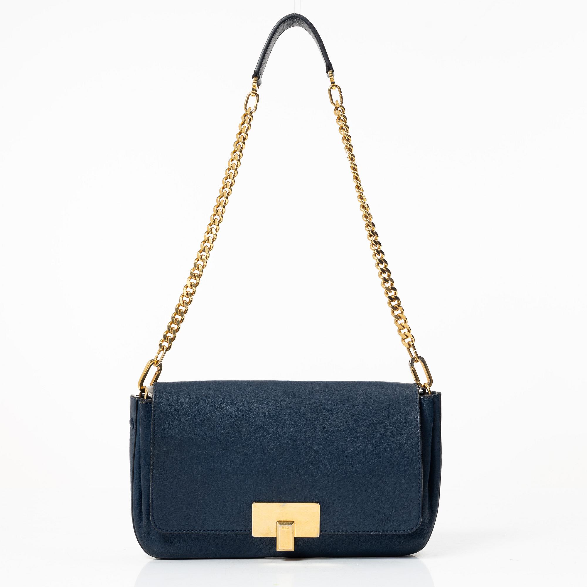 Chloé, a blue leather bag.