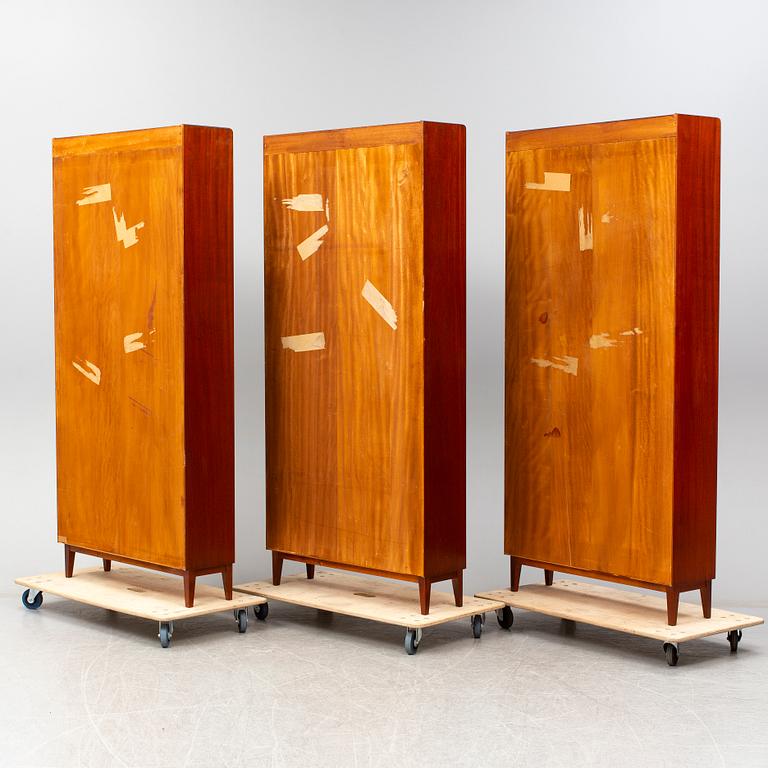 Three mahogany bookcases, mid 20th Century.