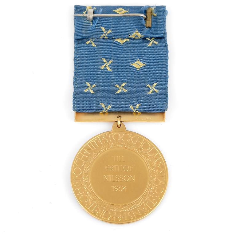 MEDALJ, 18k guld, 1954. Total vikt 31,9 gram.