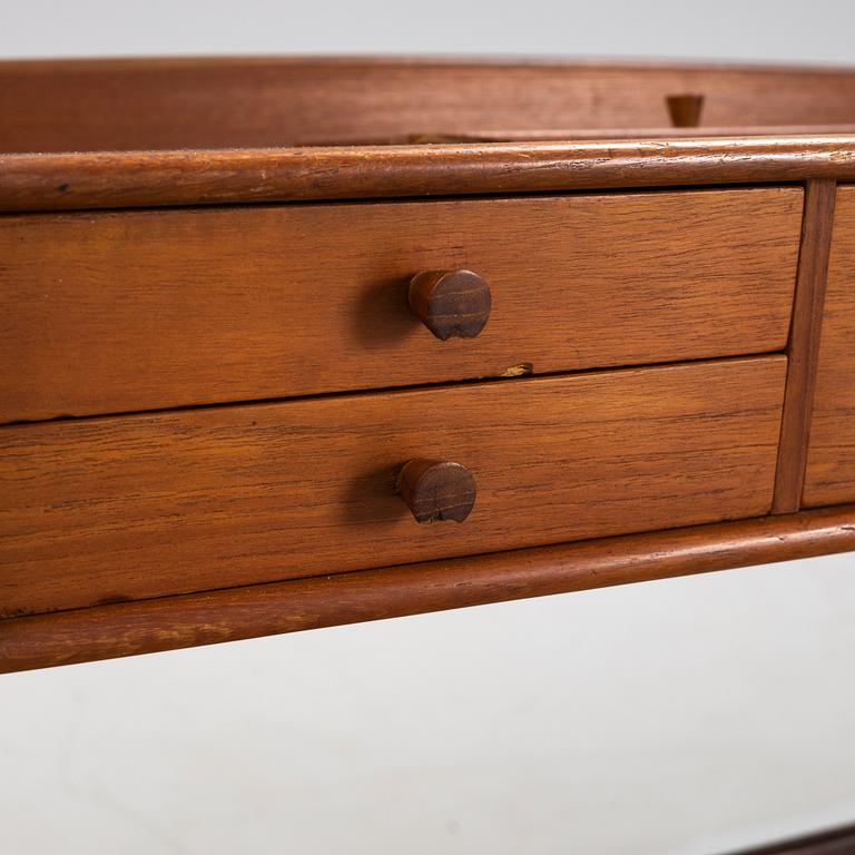 Svend Åge Madsen, a teak veneered dressing table, Denmark, 1960's.