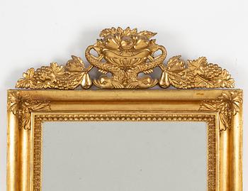 A mid 19th century mirror sconce.