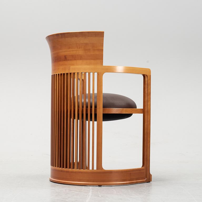 A model 606 'Barrel' chair by Frank Lloyd Wright for Cassina, designed 1937.