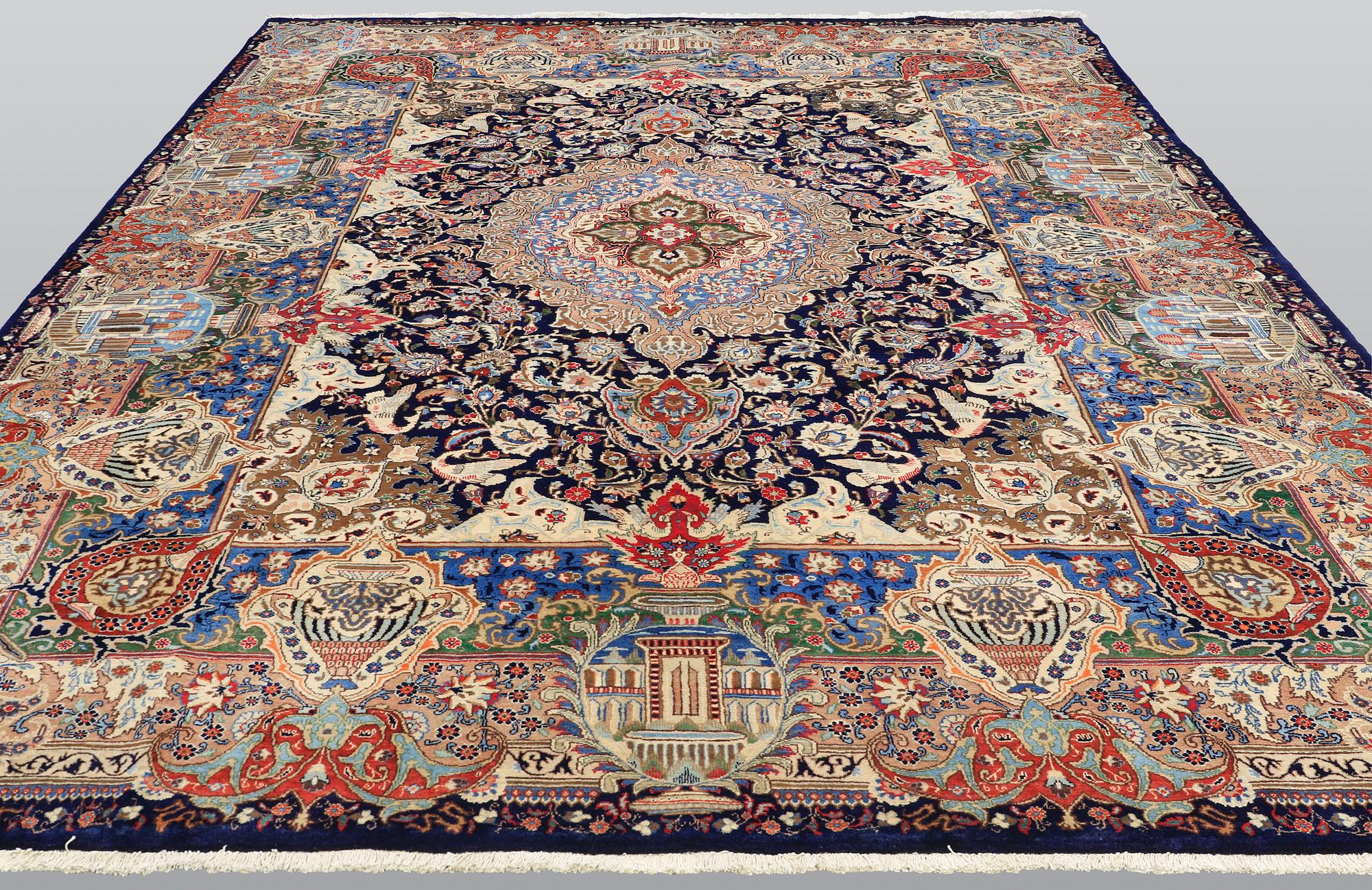 A carpet, Figural Kashmar, ca 407 x 305 cm.