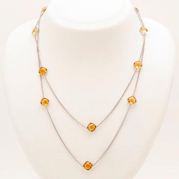 An 18K white gold necklace set with faceted citrines.