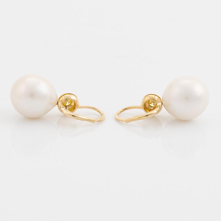 Freshwater pearl and colour treated yellow diamond earrings.