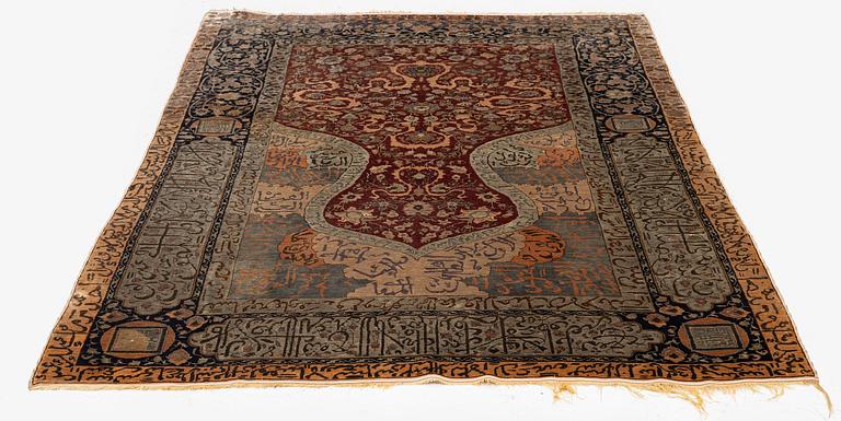 An antique silk rug, probably Istanbul, Turkey, c. 181 x 127 cm.