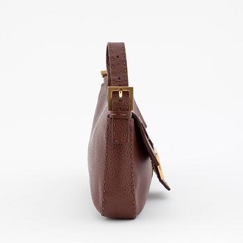FENDI, a brown leather shoulder bag, "Baguette".