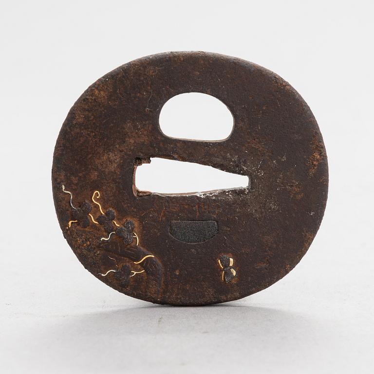 Japanese sword mountings, tsuba and tsuka.