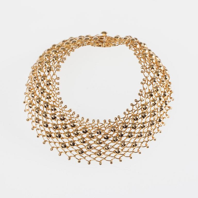 ARMSMYCKE, 18K guld. 1900-talets senare hälft. Vikt 19,3 g.