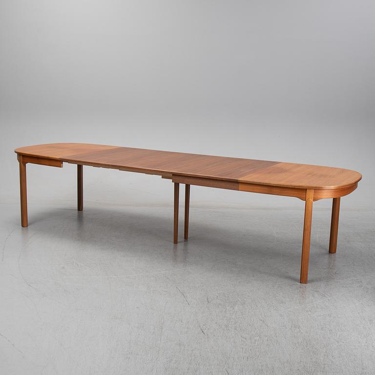 Carl Malmsten, A five-piece walnut 'Ambassadör' dining suite by Carl Malmsten.