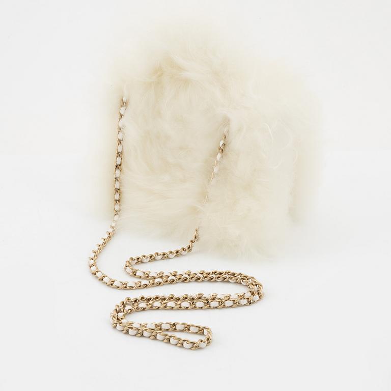 A Chanel 'Metiers D'Art Paris Hamburg Shearling Sheepskin Top Handle Bag'.
