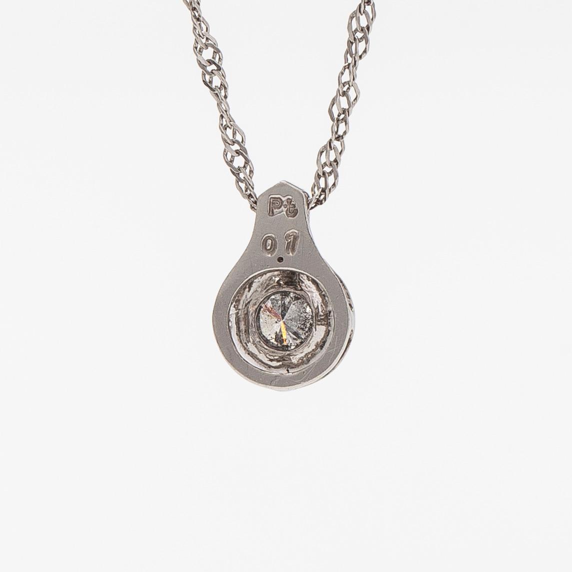 A platinum necklace, with a round brilliant-cut diamond ca. 0.10 ct.